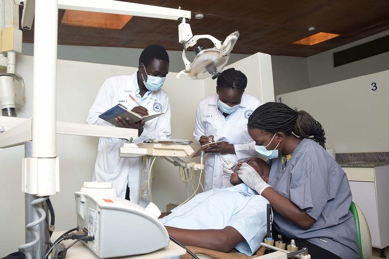 Students and a tutor during a supervised dental practical